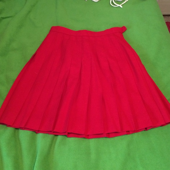 Bright red pleated skirt