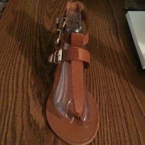 Tan and gold sandals