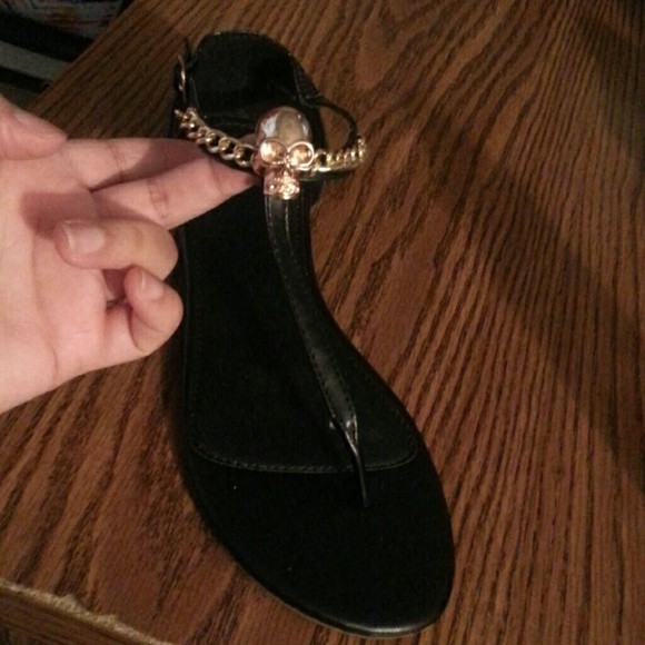 Black and gold sandals