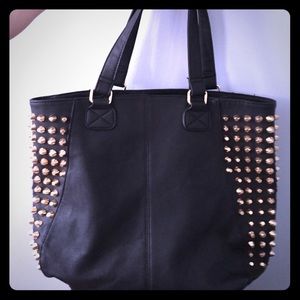 Black shoulder bag with gold studs