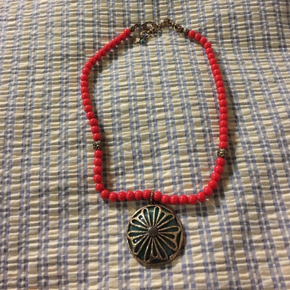 Necklace with reversible pendant