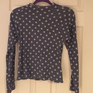 Sweater zips up the back