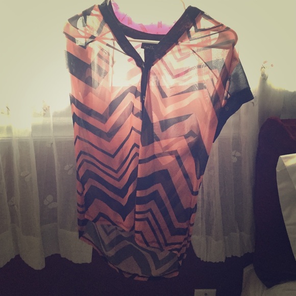 Salmon and black chevron shirt.