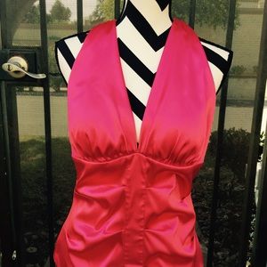 Fuschia halter top with zipper on the back.