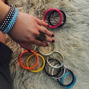 ONlY THE COLORFUL BRACELETS ( not ring )