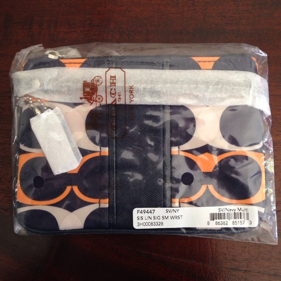Brand new, never opened Coach Sm Wristlet.