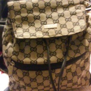 Small backpack gray & black estimated size 8x10