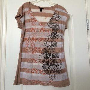 Light brown and white thin top with design