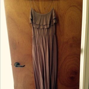 Tan maxi dress with ruffles and lace up back