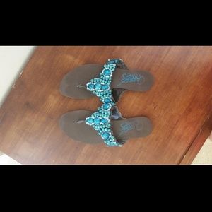 Brown and blue sandals