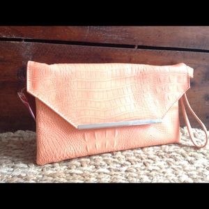 Bright coral clutch