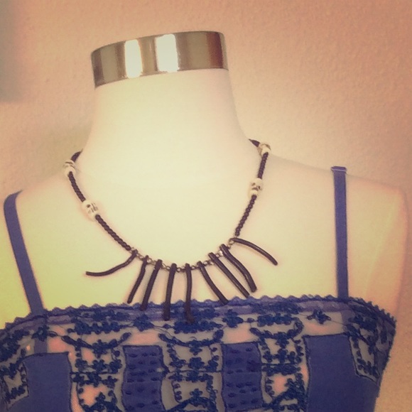 Skull beads and black bead necklace