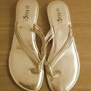 Gold flip flops