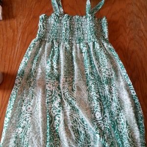 Green floral print babydoll tank.