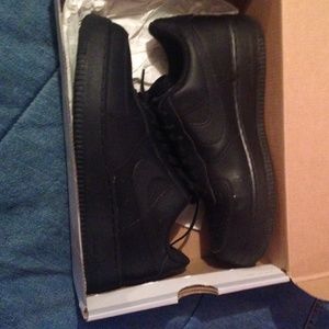 Black low top Air Force 1s