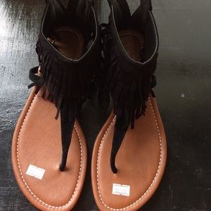 Black fringe shoes.