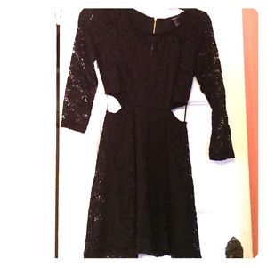 Black lace flow dress, cut outs on the side.