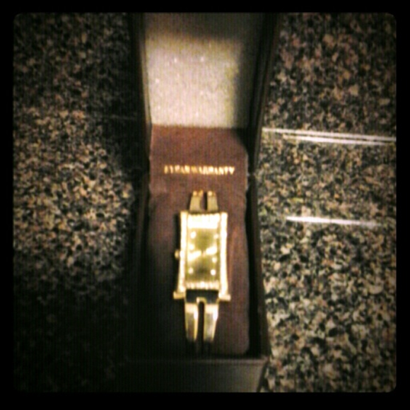 New gold tone watch