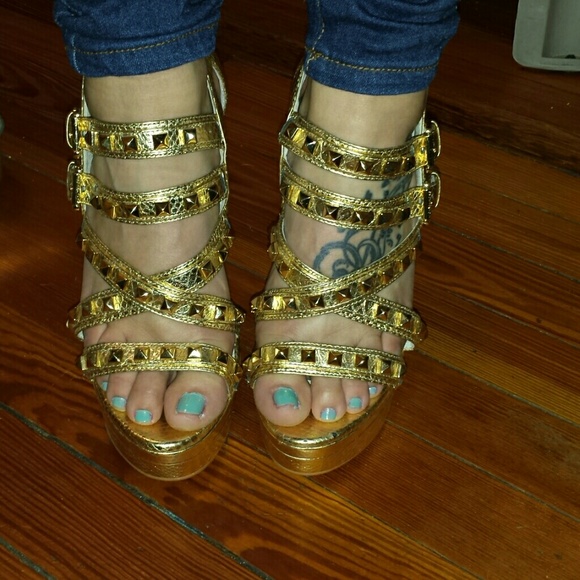 Gold and gold studded heels