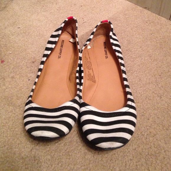 Black and white striped flats
