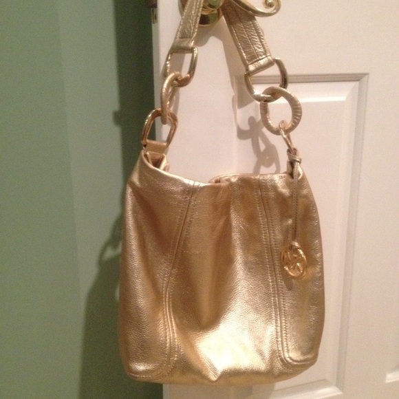 Gold Michael Kors hobo bag