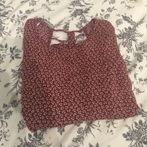 Dark red half sleeve shirt.