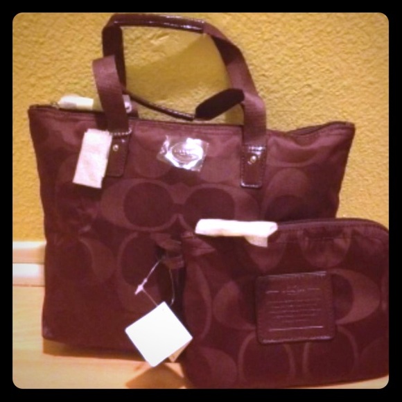 Coach Handbags - Coach Getaway Bordeaux Signature weekender NWT!