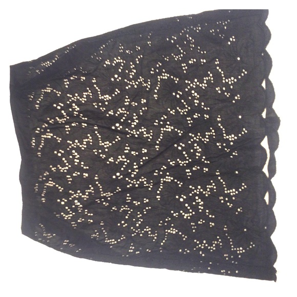Black pencil skirt with beige underlying skirt