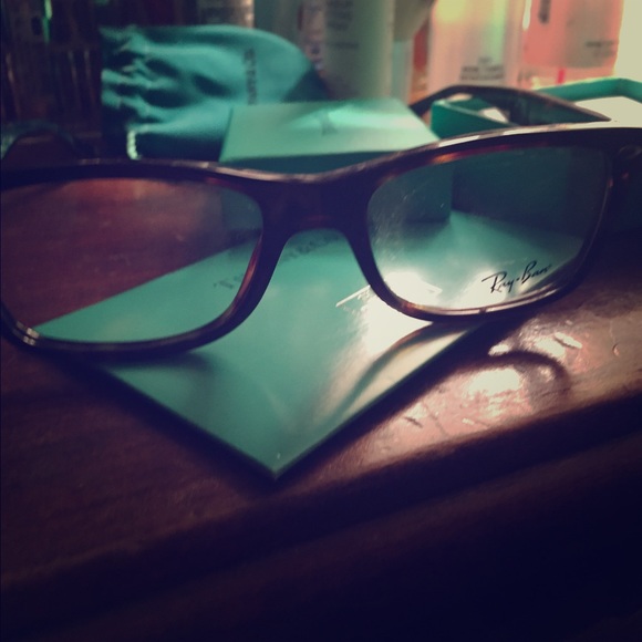 Ray ban glasses.