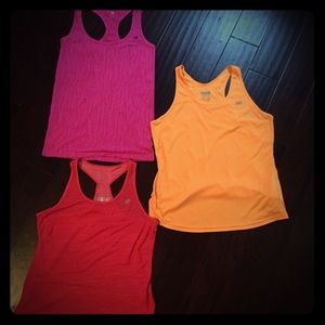 3 New Balance tanks