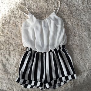 Romper high waisted size M FITS 4/6.