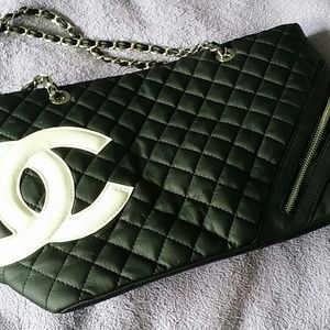 Black handbag with chain straps