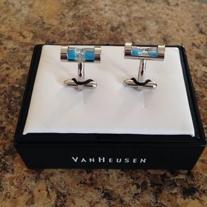 Cuff links, blue sand timer ... Sand is real!