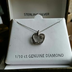 Sterling silver apple pendant with .10 ct diaminds