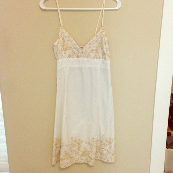 White sundress with tan floral detail