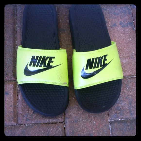 A pair of Nike Slides