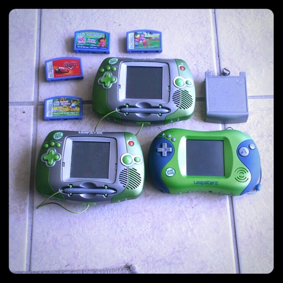Three leapster systems with 4 games included.