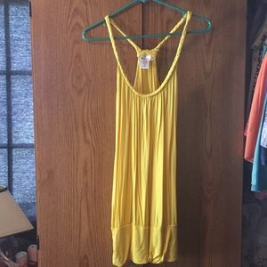 Bright yellow tunic razorback tank.