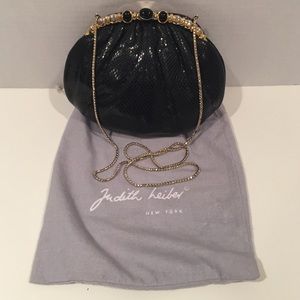 Judith Leiber black lizard with gold hardware bag