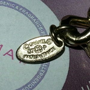 AUTHENTIC Chanel charm necklace