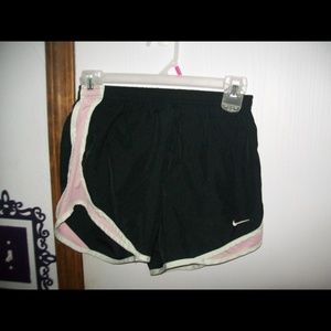 light pink Nike shorts