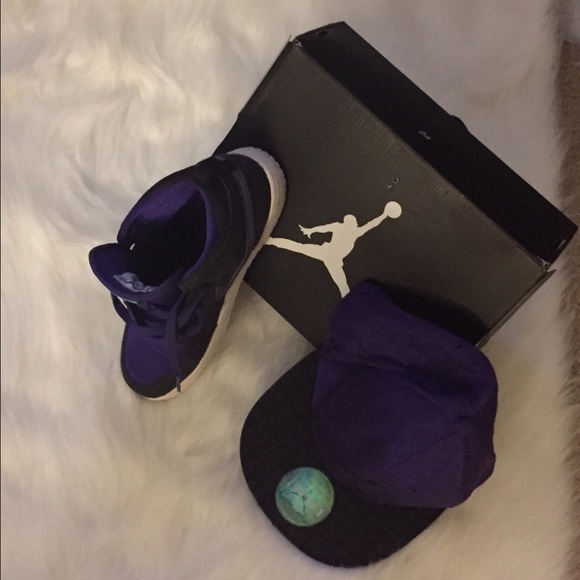 Girls Purple/Black Air Jordans and hat.