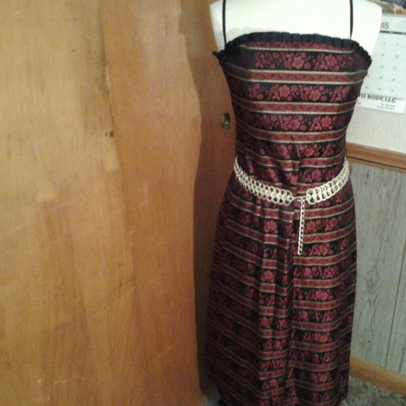Red,black and gold colored dress