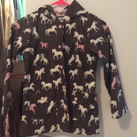 little girls rain jacket.... WITH HORSES