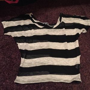 Black and white striped short sleeve shirt.