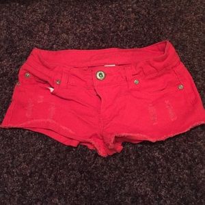 Denim fire red "destroyed" jeans