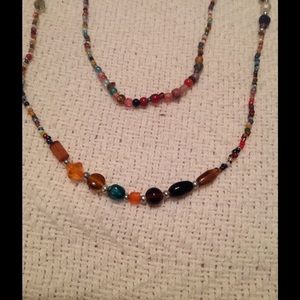 Multi strand, multi colored, beaded necklace.