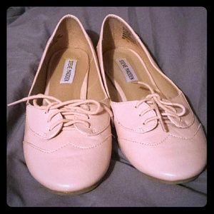 Pink Oxford style flats