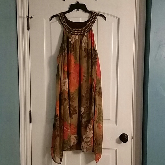 Beautiful floral pattern with embellished neckline