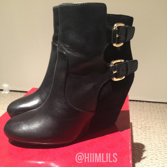 Leather wedge booties with buckle accents